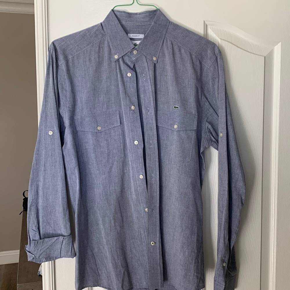 Lacoste size 40.  My husband wears medium typically.